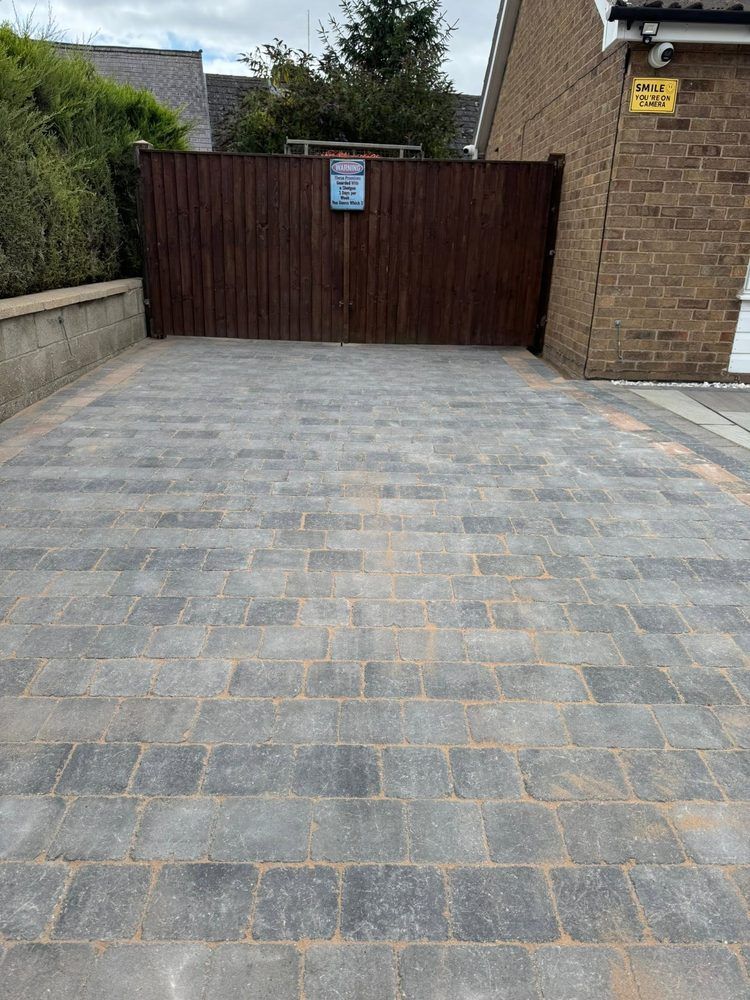 New block-paved driveway after